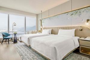 Voodi või voodid majutusasutuse Shangri-La Nanshan, Shenzhen, Stay for 2 consecutive nights and enjoy breakfast toas