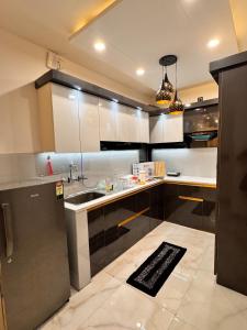 a kitchen with a sink and a counter top at YOUR BnB in Jāmb