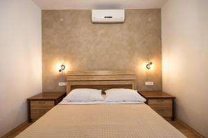 Postel nebo postele na pokoji v ubytování Apartments Škara