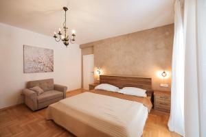 Postel nebo postele na pokoji v ubytování Apartments Škara