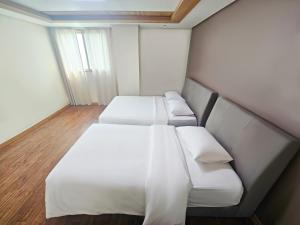 Letto o letti in una camera di Ilsung Resort Sulak