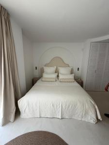 Łóżko lub łóżka w pokoju w obiekcie Apartment Marbella - Puente Romano Area