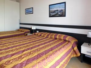 Posteľ alebo postele v izbe v ubytovaní Villaggio Hemingway - Family Aparthotel