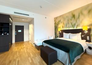 Ένα ή περισσότερα κρεβάτια σε δωμάτιο στο Best Western Plus Park City Lund