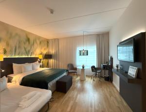 Ένα ή περισσότερα κρεβάτια σε δωμάτιο στο Best Western Plus Park City Lund