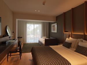 Postel nebo postele na pokoji v ubytování Pendeli Resort