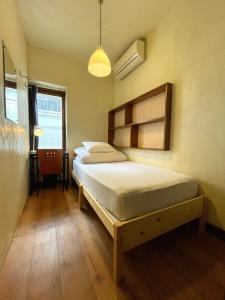 Ένα ή περισσότερα κρεβάτια σε δωμάτιο στο Nomad Hostel Classic