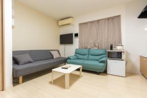 Area soggiorno di Direct Access to Umeda Private Stay for 3 Guests