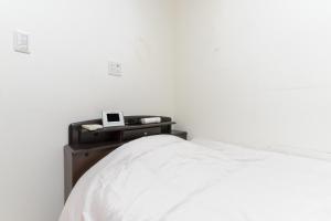 Letto o letti in una camera di Direct Access to Umeda Private Stay for 3 Guests