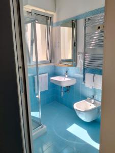 Koupelna v ubytování Hotel Lido