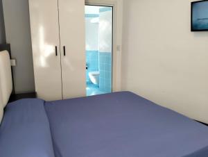 Postel nebo postele na pokoji v ubytování Hotel Lido