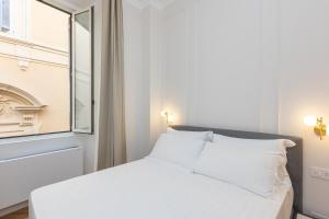 Ένα ή περισσότερα κρεβάτια σε δωμάτιο στο Casa Castellino