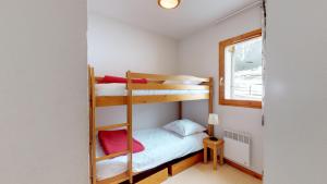 Postel nebo postele na pokoji v ubytování Balcons B 007 - PARC NAT VANOISE appart 6 pers