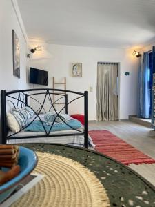 TV a/nebo společenská místnost v ubytování Stamatis Rooms + 37 fotografií