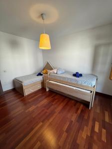 Giường trong phòng chung tại Villa Lava +14 ảnh