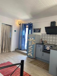 Kuchyň nebo kuchyňský kout v ubytování Stamatis Rooms