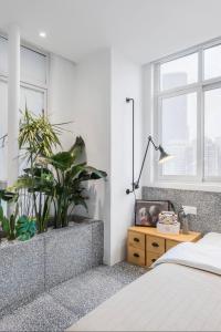 Postel nebo postele na pokoji v ubytování Chongqing Justom Family Apartment Hotel Jiaochangkou Branch