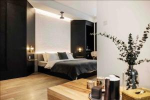 Postel nebo postele na pokoji v ubytování Chongqing Justom Family Apartment Hotel Jiaochangkou Branch
