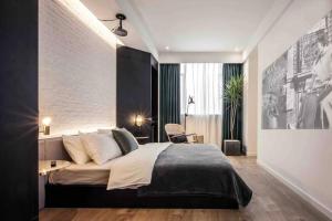 Postel nebo postele na pokoji v ubytování Chongqing Justom Family Apartment Hotel Jiaochangkou Branch