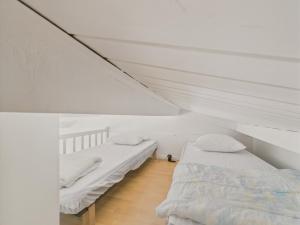 Ένα ή περισσότερα κρεβάτια σε δωμάτιο στο 500 m de la plage, appart 2 adultes 2 enfants