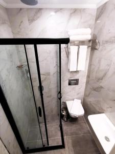 Koupelna v ubytování Luxx Garden Hotel