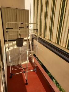 a bird cage in front of a window at Largo in Crikvenica