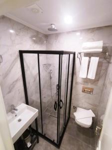 Koupelna v ubytování Luxx Garden Hotel