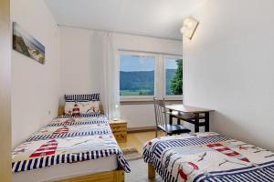 Postel nebo postele na pokoji v ubytování Ferienwohnung Schwäbische Alb