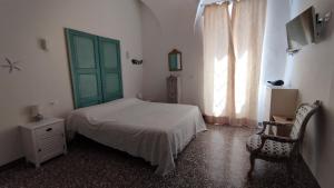 Postel nebo postele na pokoji v ubytování Casa Mazzini di Casa Italia + 24 fotografií