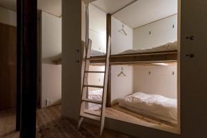 Postel nebo postele na pokoji v ubytování Shizuya KYOTO