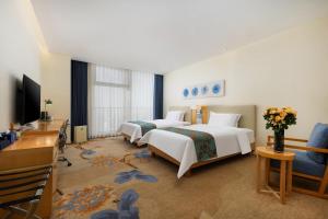 TV i/ili multimedijalni sistem u objektu 石家庄华强诺华廷酒店 Novlion hotel