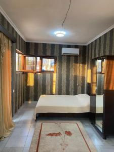 Rúm í herbergi á Hotel Kvadrati