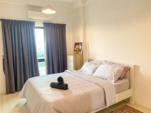 Postel nebo postele na pokoji v ubytování Cozy Emira Home 3 Bedrooms