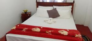 Letto o letti in una camera di Stay Logi Nanuoya