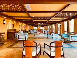 Karamay West Wuzhen Tancheng Hotel的休息区