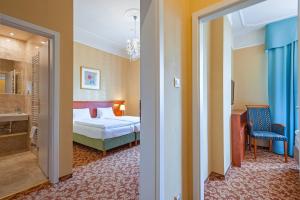 Łóżko lub łóżka w pokoju w obiekcie Spa Resort PAWLIK-AQUAFORUM