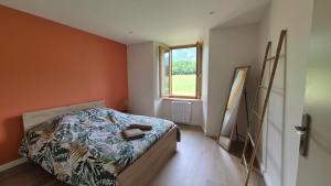 Postel nebo postele na pokoji v ubytování La Ferme Lazare - maison entièrement rénovée