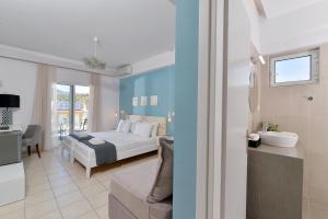 Cama ou camas em um quarto em Hotel Kalloni