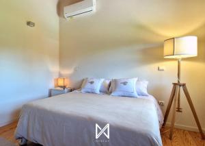 En eller flere senge i et værelse på MyStay - Quinta do Louro + 31 billeder