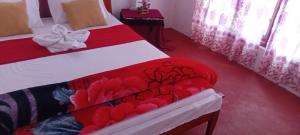 Letto o letti in una camera di Stay Logi Nanuoya