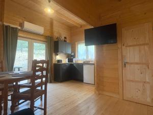 Kuchyň nebo kuchyňský kout v ubytování Chalet Chêne-Pin