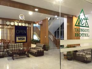 A seating area at UCT Taunggyi Hotel