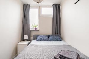Posteľ alebo postele v izbe v ubytovaní Przechodnia2-ac-park View-2 Rooms