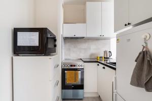 Kuchyňa alebo kuchynka v ubytovaní Przechodnia2-ac-park View-2 Rooms