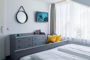 Ένα ή περισσότερα κρεβάτια σε δωμάτιο στο Haus Seeblick Wohnung 21 Forever21