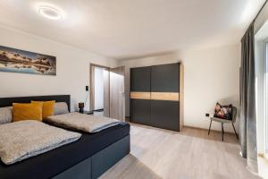 Una cama o camas en una habitación de Apart Bergverliebt