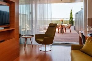 TV a/nebo společenská místnost v ubytování Lielupe Hotel SPA & Conferences by Semarah