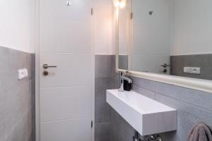 Koupelna v ubytování TinyGreens B & B