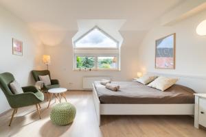 Postel nebo postele na pokoji v ubytování TinyGreens B & B