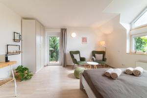 Postel nebo postele na pokoji v ubytování TinyGreens B & B